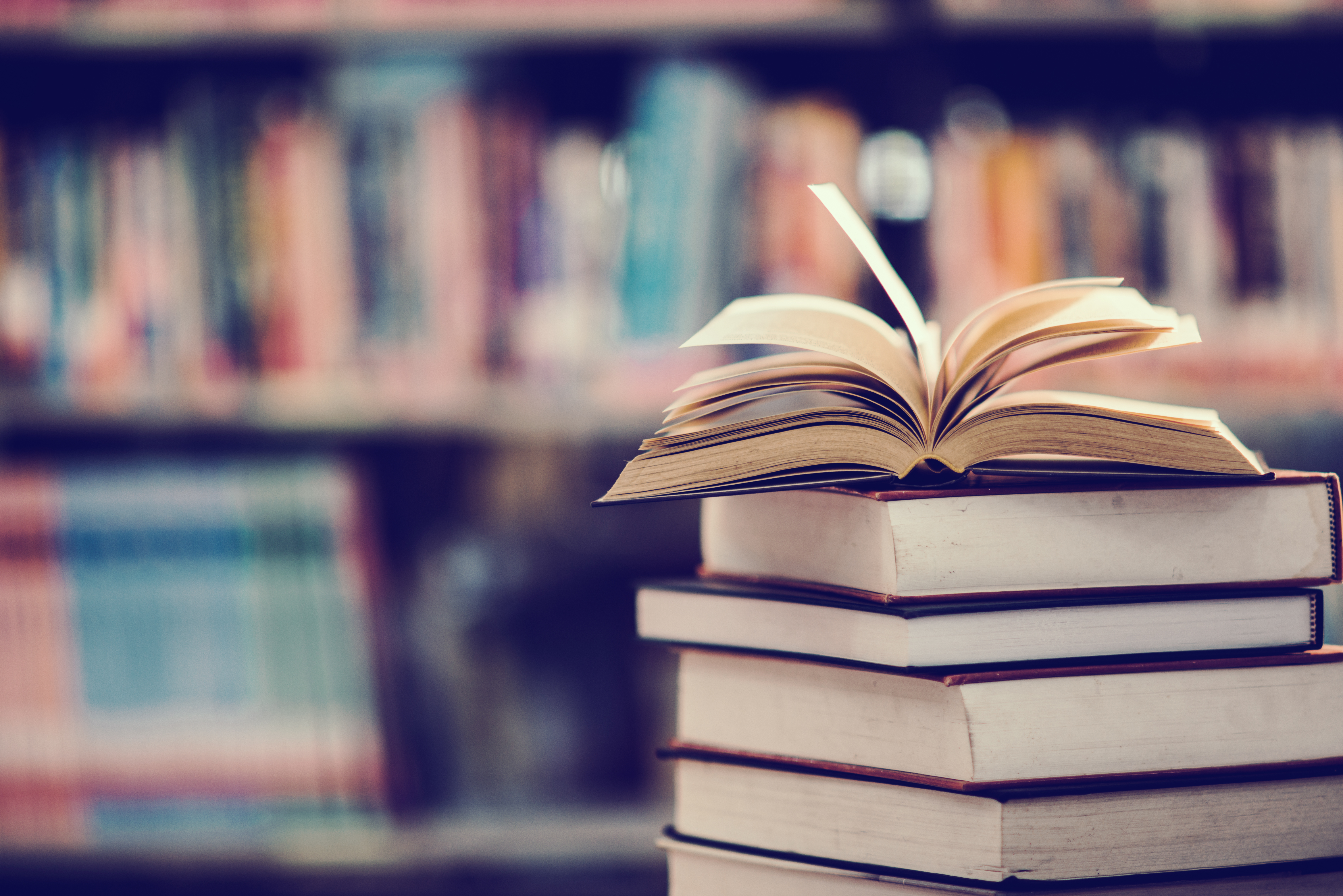 book-library-with-open-textbook.jpg