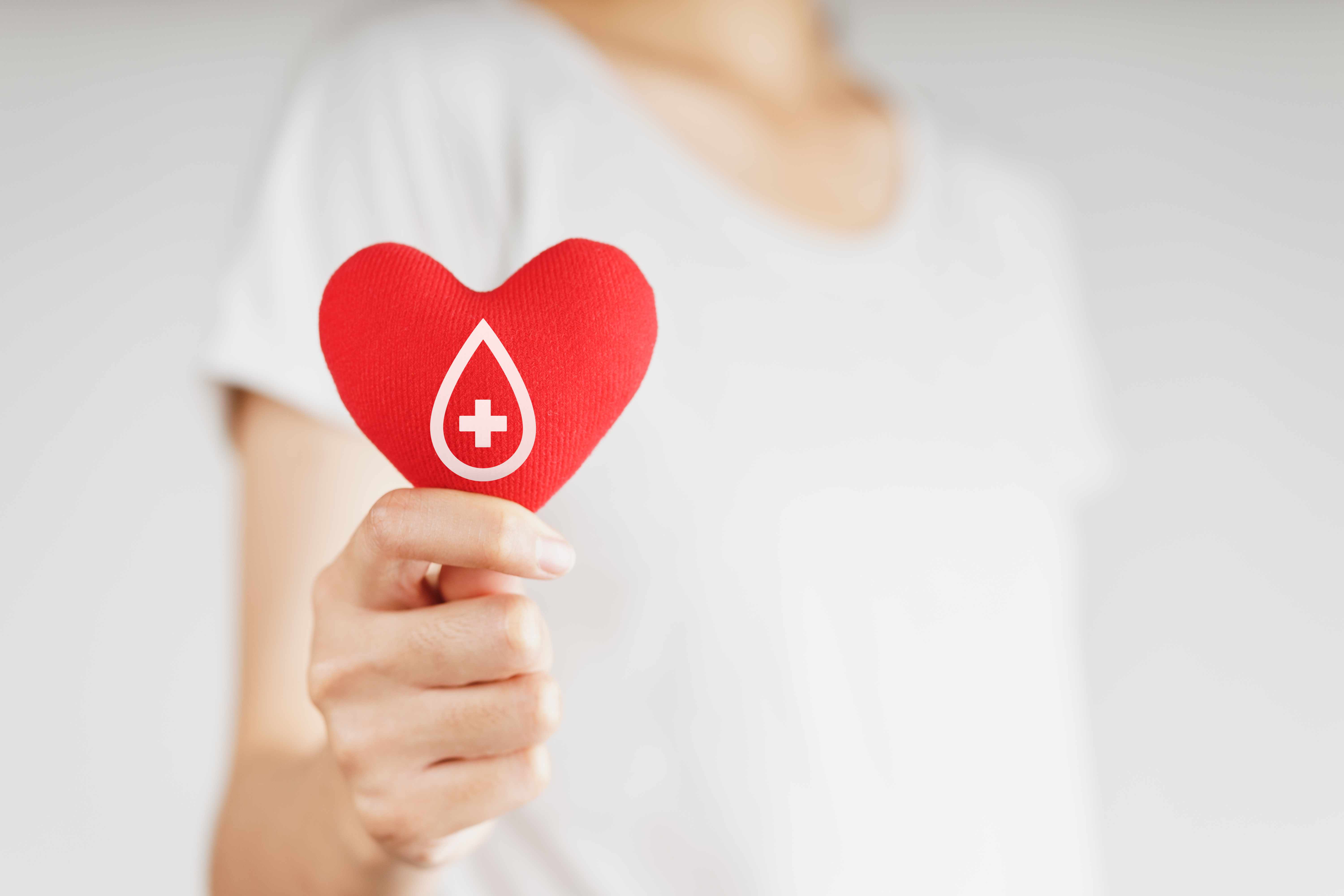 vecteezy_woman-hands-holding-red-heart-with-blood-donor-sign-healthcare-medicine-and-blood-donation-concept_2910448.jpg