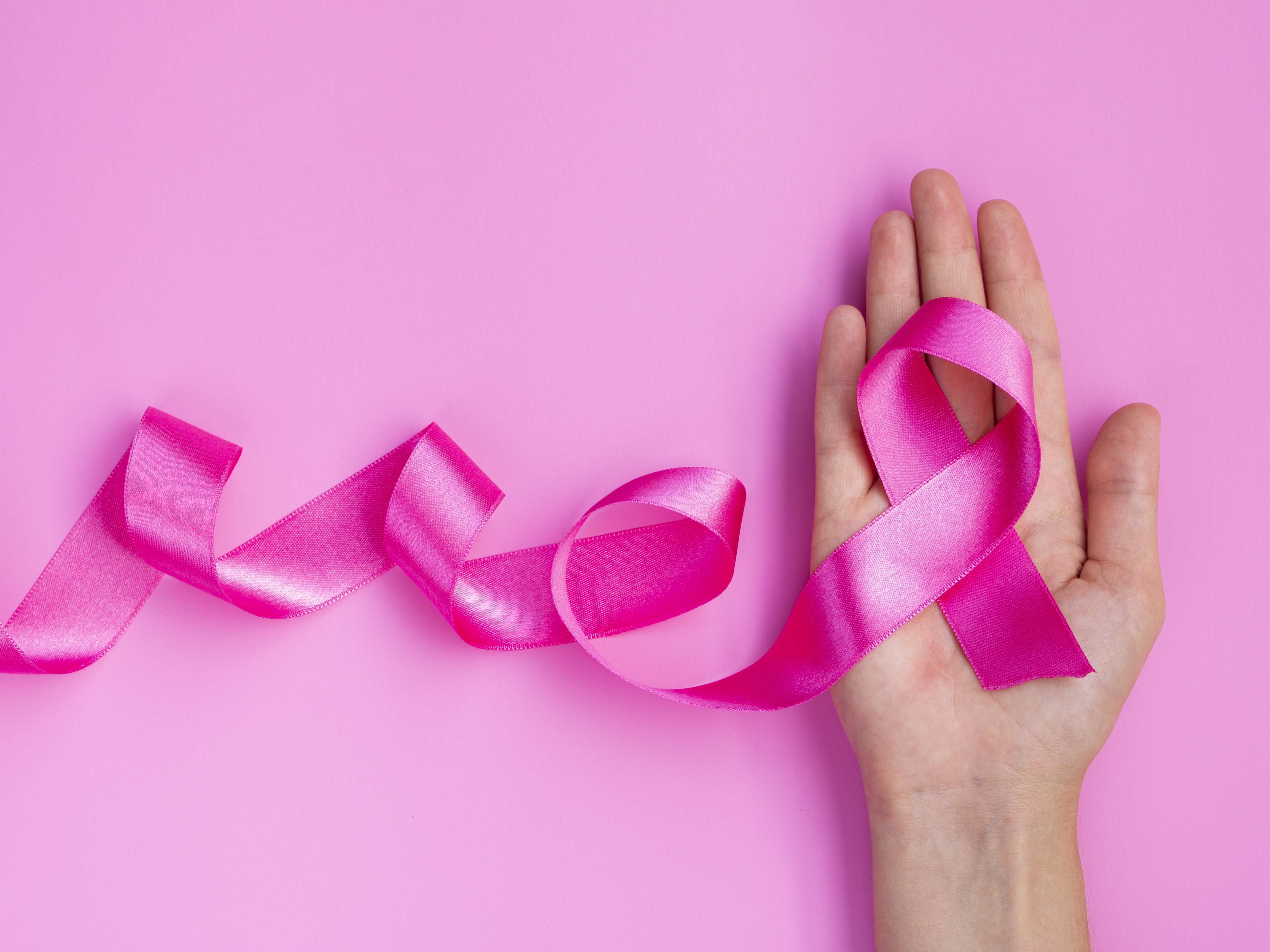 close-up-pink-ribbon-hand.jpg